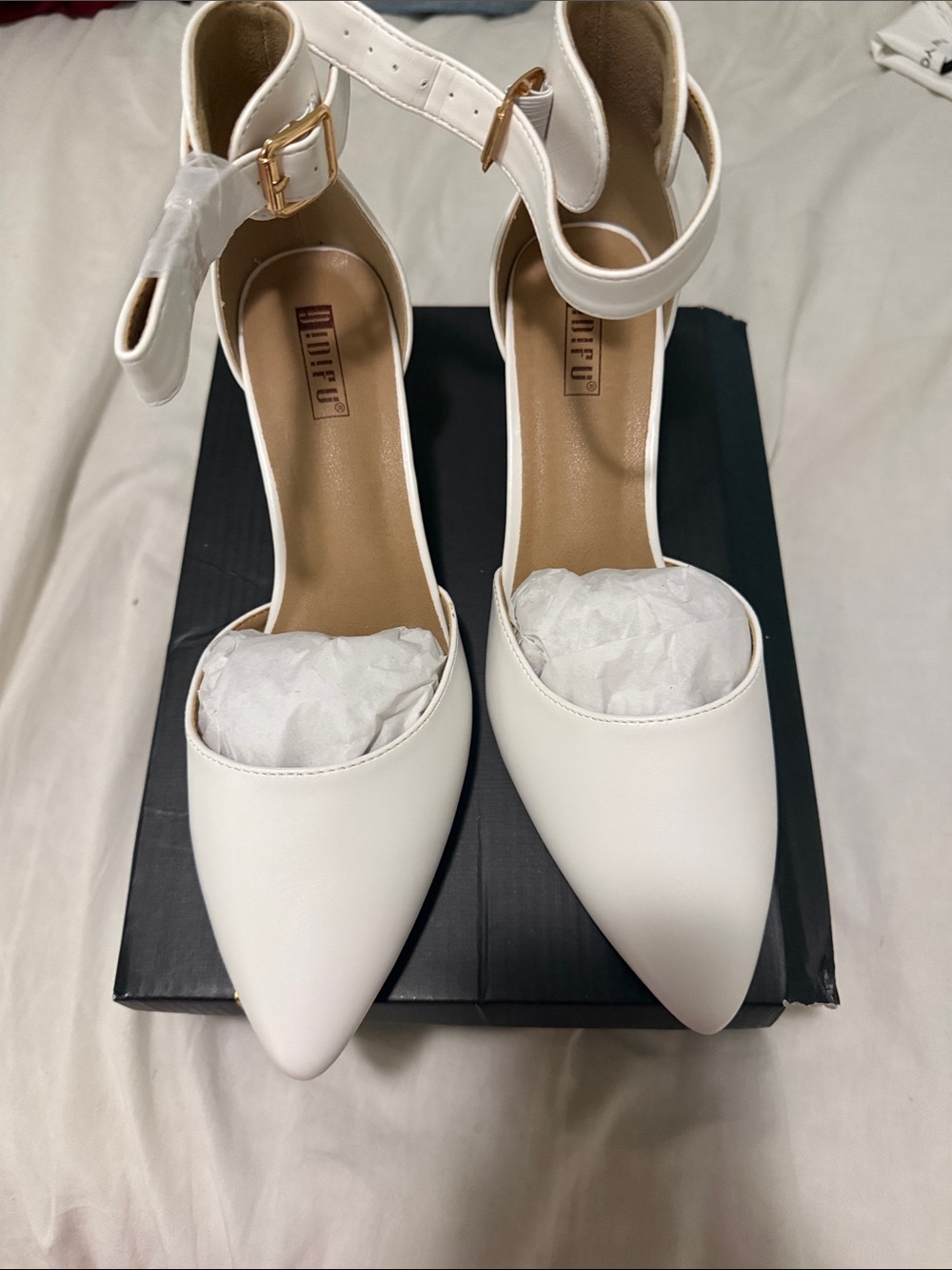 IDIFU White Pointed Ankle-Strap Heels with Gold Buckle